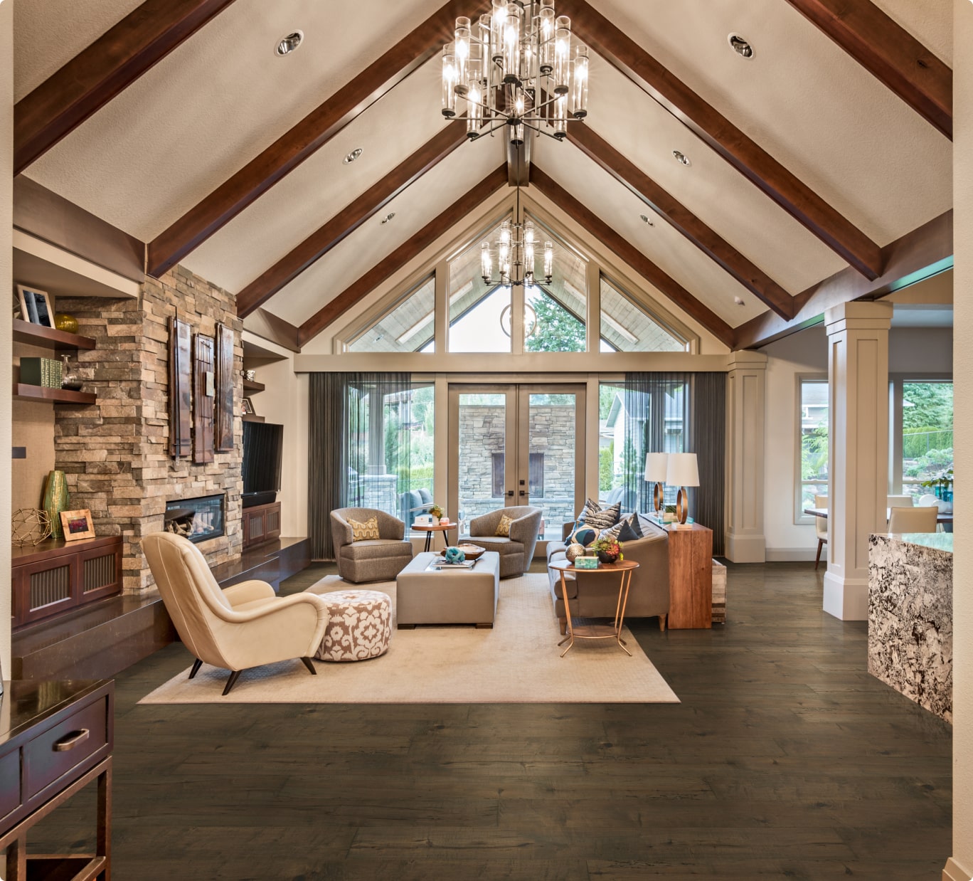 living room with cathedral ceiling and wooden beams with wood flooring